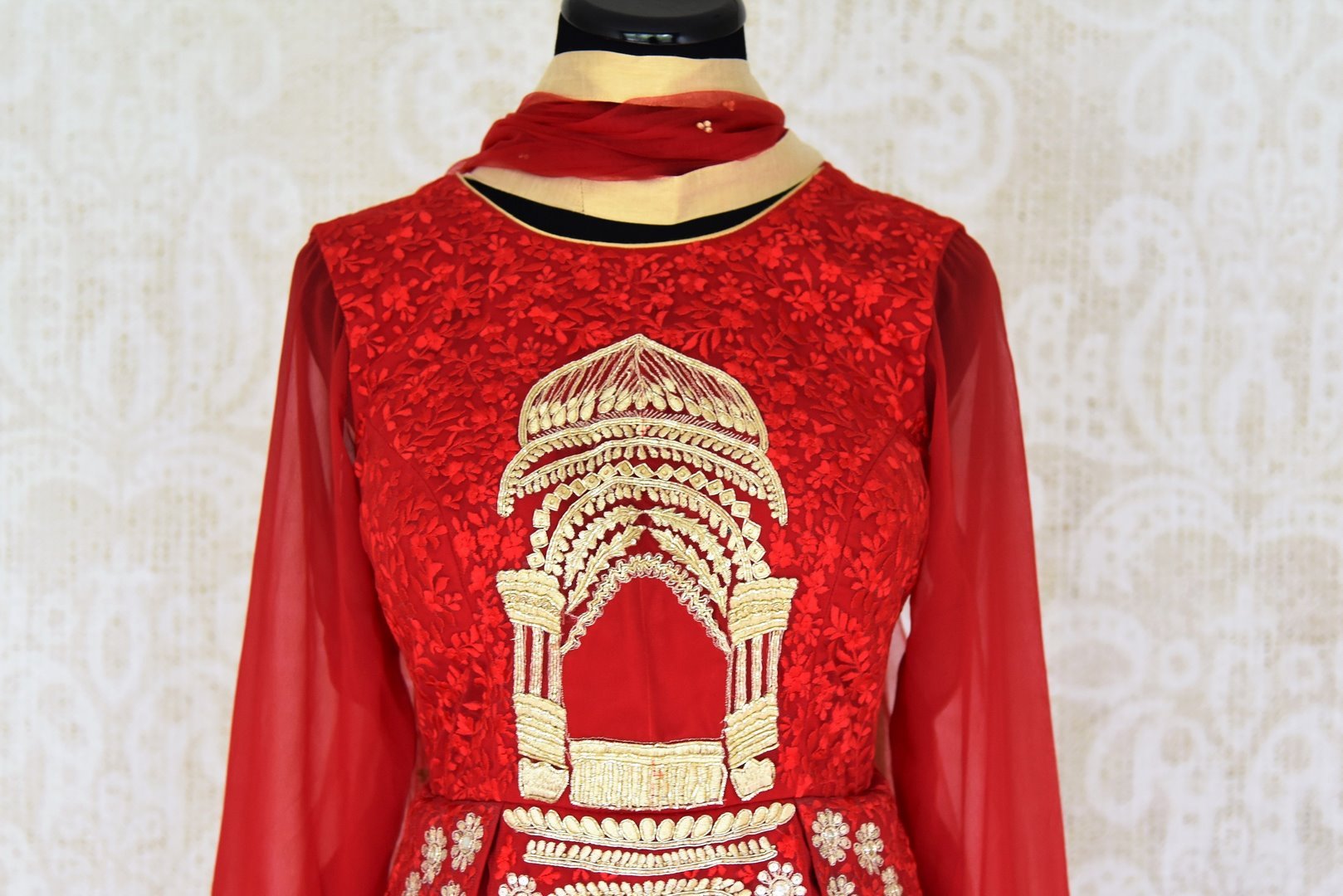 Buy red embroidered georgette silk floor length suit online in USA with dupatta. Find a range of Indian designer suits at Pure Elegance clothing store in USA. Keep your ethnic look perfect with a range of traditional Indian clothing, designer silk sarees, wedding sarees, wedding dresses and much more also available at our online store. -top