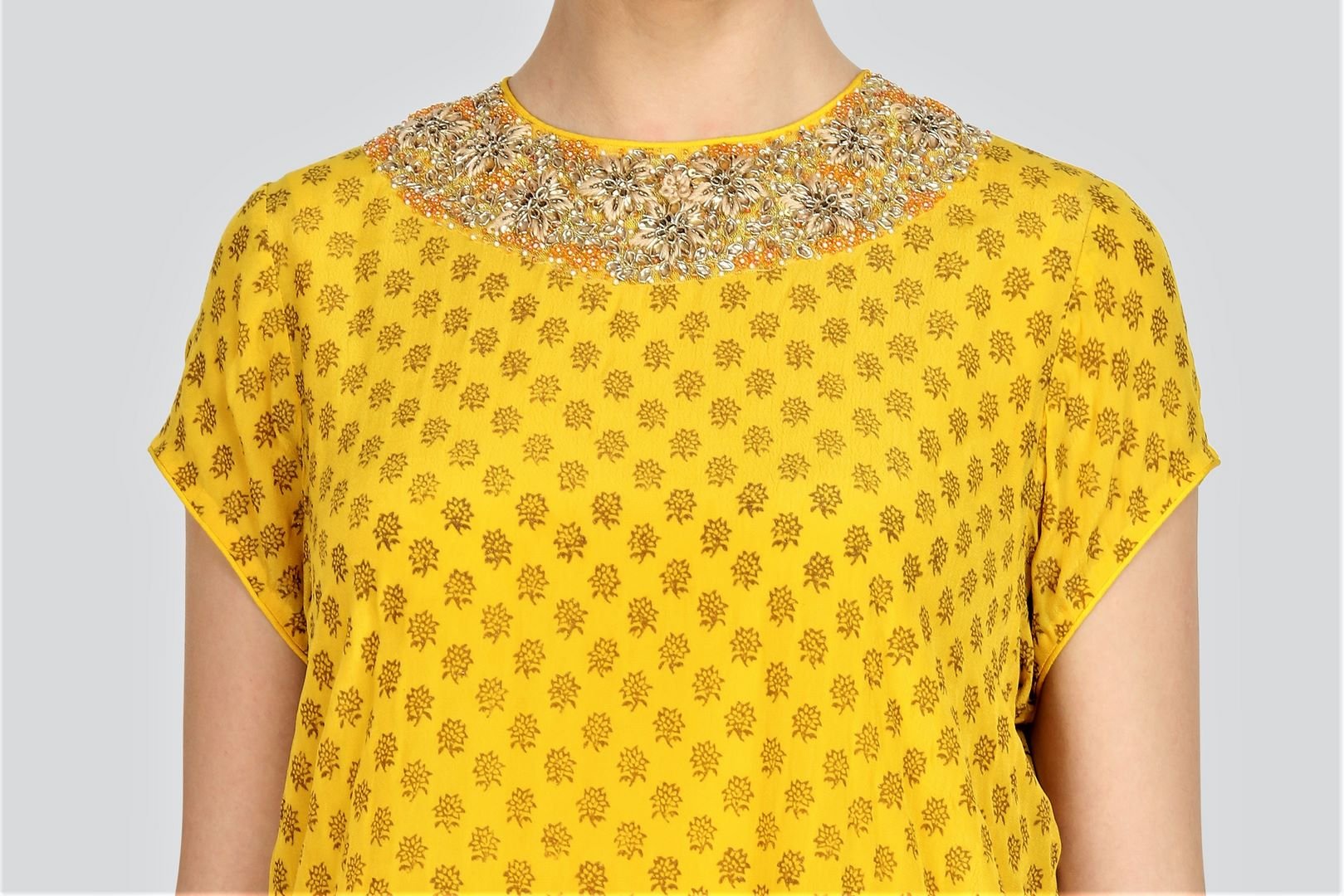 Buy ethnic yellow embroidered crepe kurta with salwar online in USA. For more such gorgeous designer dresses, shop at Pure Elegance Indian fashion store in USA. A beautiful range of traditional Indian sarees and designer clothing is available for Indian women living in USA. You can also shop at our online store.-top
