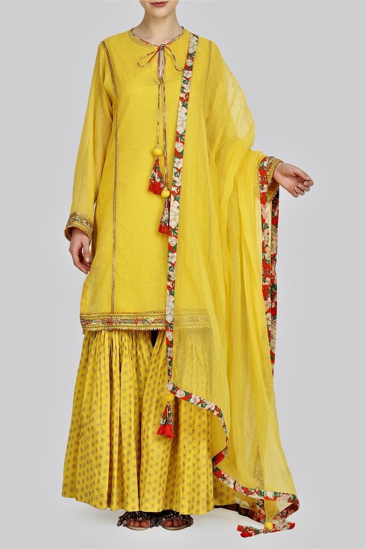 Shop yellow kota doria kurta with sharara and dupatta online in USA. For more such gorgeous designer dresses, shop at Pure Elegance Indian fashion store in USA. A beautiful range of traditional Indian sarees and designer clothing is available for Indian women living in USA. You can also shop at our online store.-full view