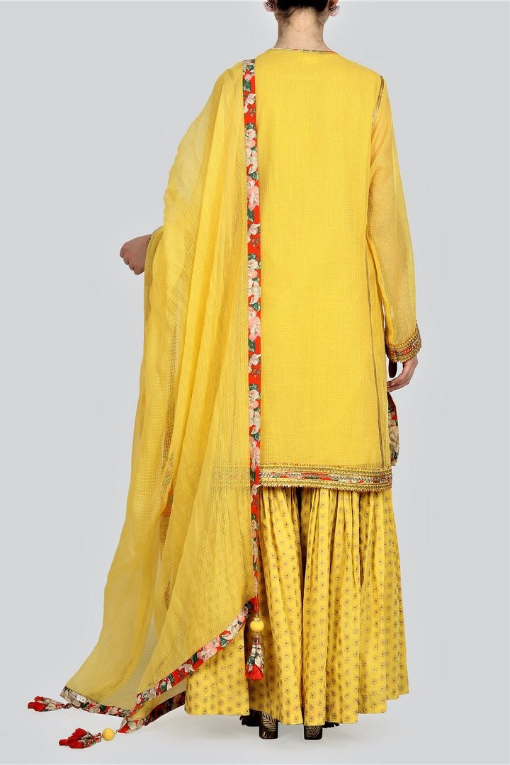 Shop yellow kota doria kurta with sharara and dupatta online in USA. For more such gorgeous designer dresses, shop at Pure Elegance Indian fashion store in USA. A beautiful range of traditional Indian sarees and designer clothing is available for Indian women living in USA. You can also shop at our online store.-back