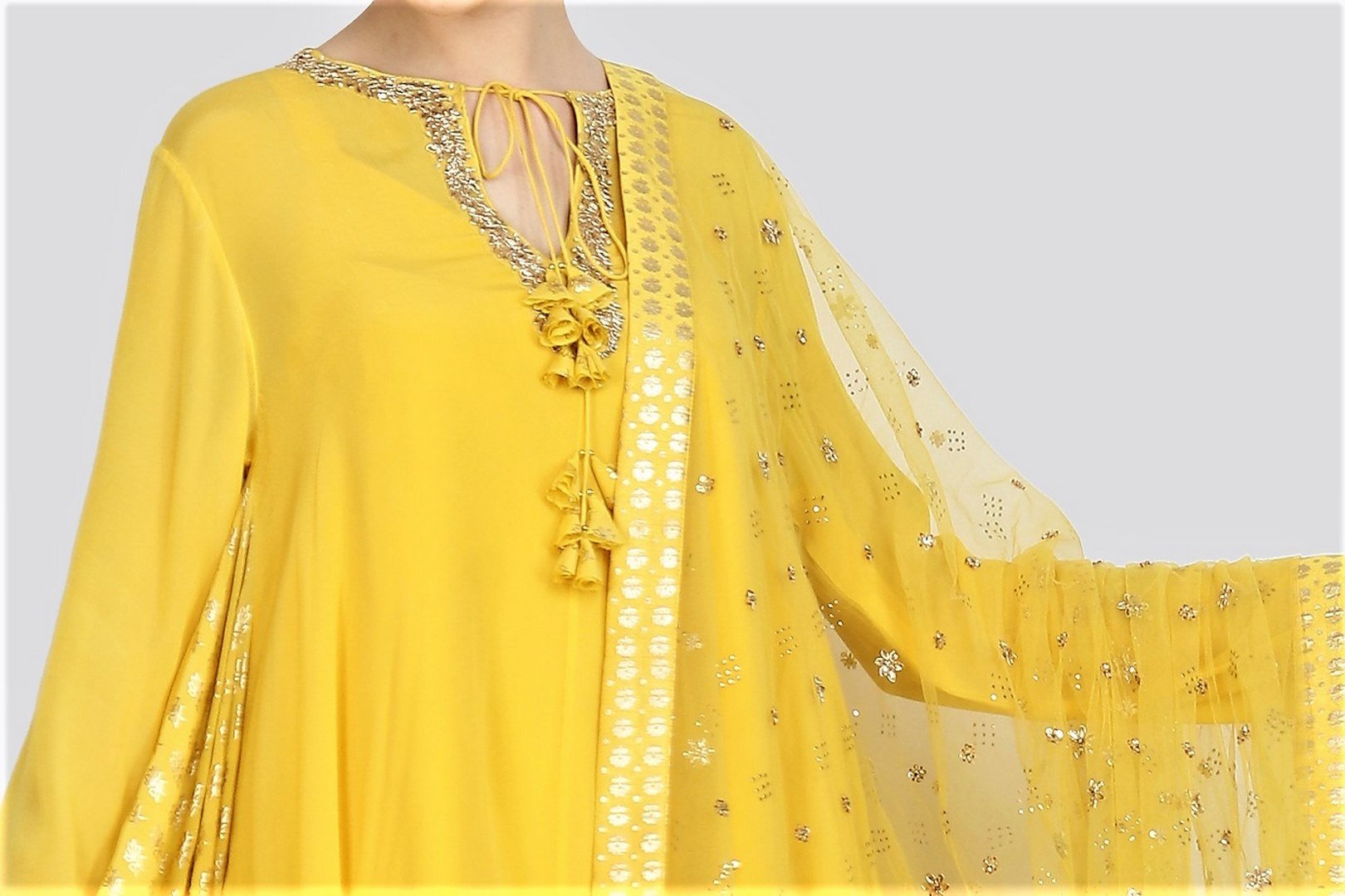 Buy yellow foil print asymmetric kurta with sharara online in USA and net dupatta. For more such gorgeous designer dresses, shop at Pure Elegance Indian fashion store in USA. A beautiful range of traditional Indian sarees and designer clothing is available for Indian women living in USA. You can also shop at our online store.-kurta
