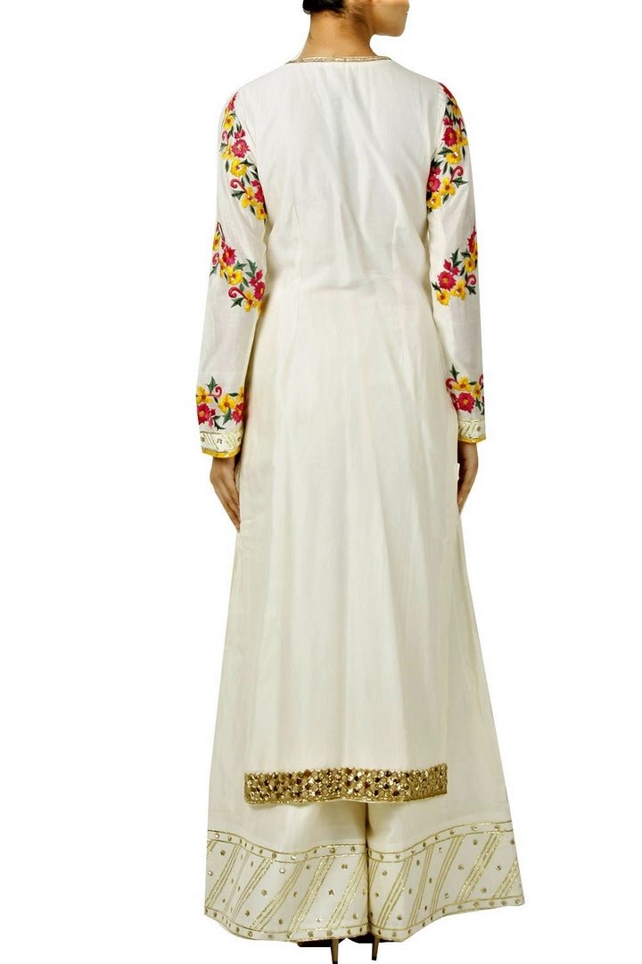 Shop online ivory embroidered chanderi kurta with palazzo pants and dupatta in USA. Find a range of Indian wedding dresses for brides at Pure Elegance clothing store in USA. Keep your ethnic look perfect with a range of traditional Indian clothing, designer silk saris, wedding saris and much more also available at our online store. -back