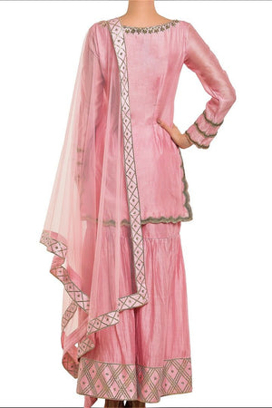 Buy rose pink embroidered chanderi silk kurta with sharara pants online in USA. Find a range of Indian wedding dresses for brides at Pure Elegance clothing store in USA. Keep your ethnic look perfect with a range of traditional Indian clothing, designer silk saris, wedding saris and much more also available at our online store. -back