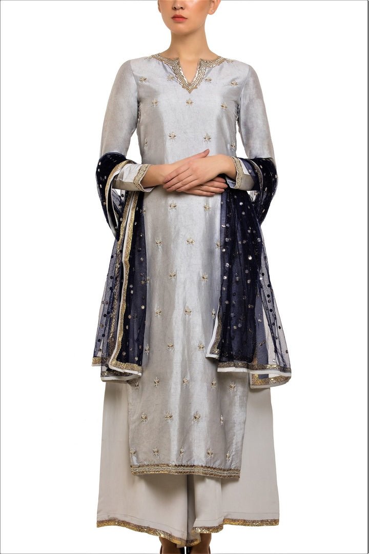 Shop grey embroidered kurta with palazzo online in USA. Find a range of Indian wedding dresses for brides at Pure Elegance clothing store in USA. Keep your ethnic look perfect with a range of traditional Indian clothing, designer silk sarees, wedding saris and much more also available at our online store. -full view