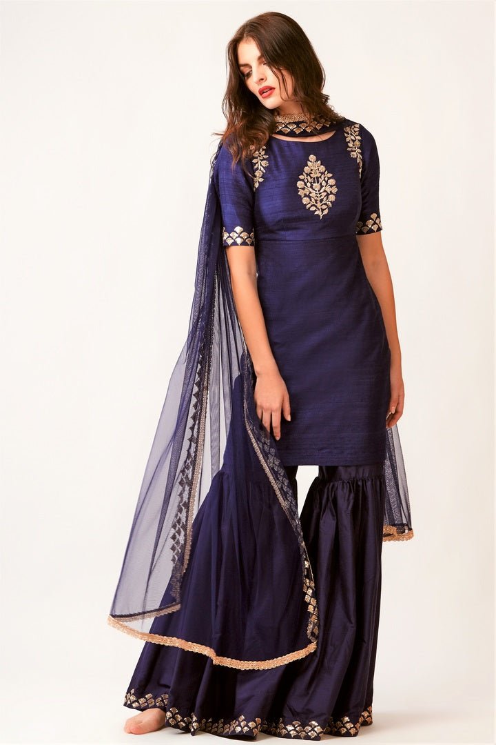 Shop navy blue embroidered raw silk kurta with embroidered sharara online in USA. You can find a fine collection of Indian designer dresses in USA at Pure Elegance clothing store. Our range of traditional Indian clothing, designer silk saris, designer suits,  at our online store is sure to leave you awestruck. -full view