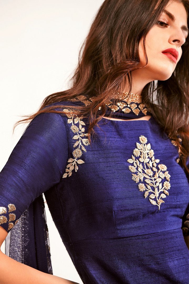 Shop navy blue embroidered raw silk kurta with embroidered sharara online in USA. You can find a fine collection of Indian designer dresses in USA at Pure Elegance clothing store. Our range of traditional Indian clothing, designer silk saris, designer suits,  at our online store is sure to leave you awestruck. -kurta