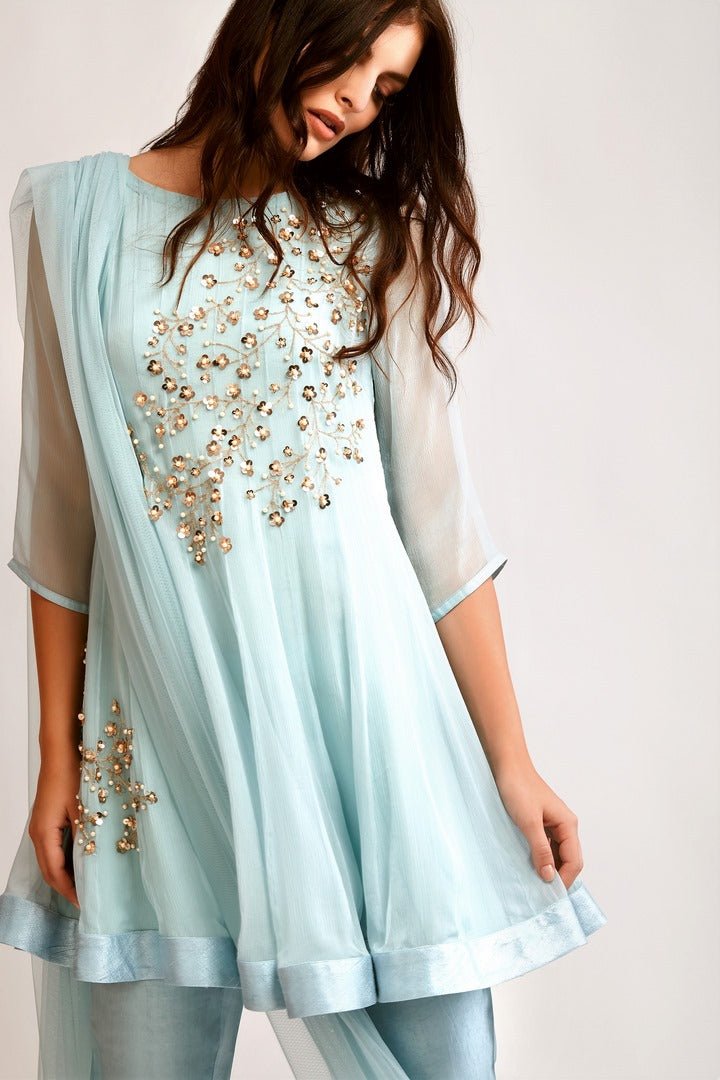 Buy soft blue embroidered chiffon short Anarkali with crop pants online in USA. You can find a fine collection of Indian designer dresses in USA at Pure Elegance clothing store. Our range of traditional Indian clothing, designer silk saris, designer suits,  at our online store is sure to leave you awestruck. -kurta
