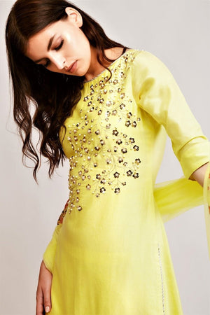 Buy pale yellow chanderi pearl work kurta with sharara online in USA. You can find a fine collection of Indian designer dresses in USA at Pure Elegance clothing store. Our range of traditional Indian clothing, designer silk saris, designer suits,  at our online store is sure to leave you awestruck. -kurta