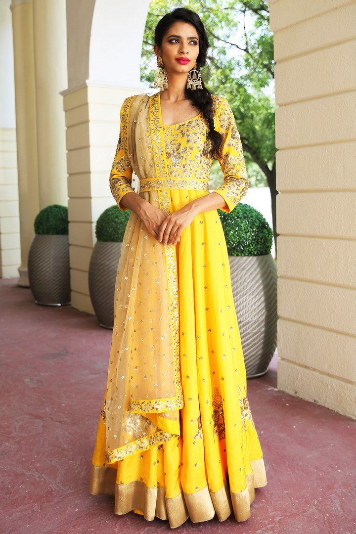 Buy ochre yellow embroidered floorlength kalidar suit with duaptta online in USA. Get occasion ready with a stunning range of Indian designer dresses from Pure Elegance fashion store in USA. Shop from a collection of designer suits, wedding lehengas and Indian clothing for a gorgeous ethnic look from our online store.-full view