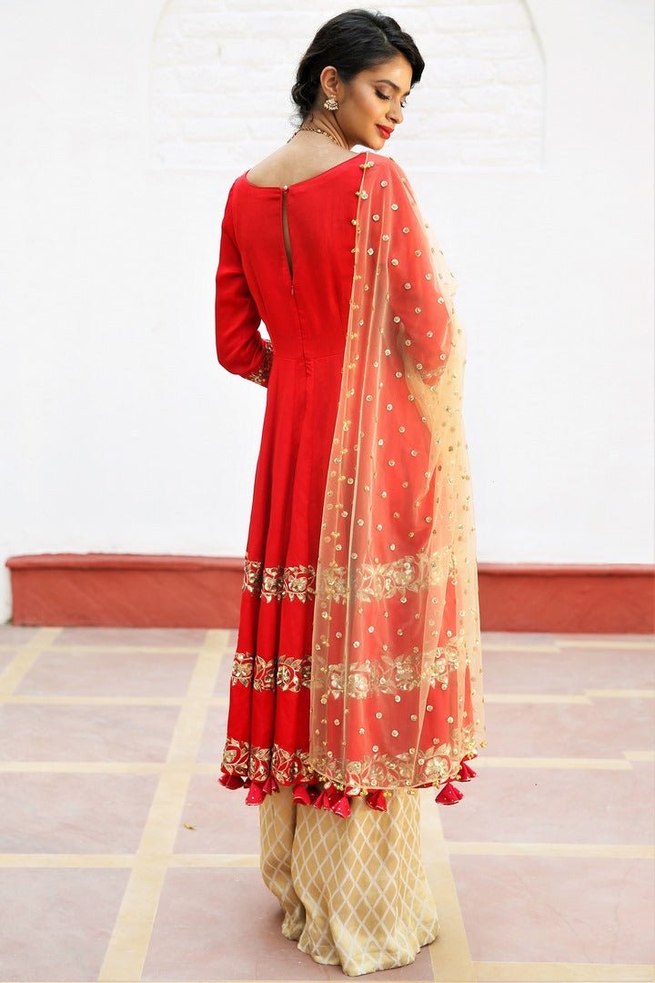 Buy crimson red short silk kalidaar with palazzo online in USA. Get occasion ready with a stunning range of Indian designer suits from Pure Elegance fashion store in USA. We bring the best designer dresses for Indian women in USA at our online store. Shop now.-back