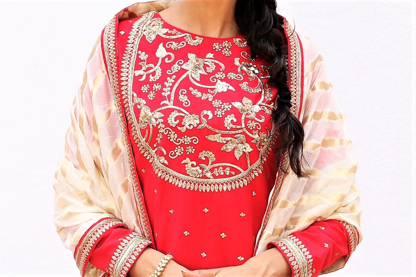 Buy crimson red short silk blend short kurta with ivory tissue garara online in USA. Get occasion ready with a stunning range of Indian designer suits from Pure Elegance fashion store in USA. We bring the best designer dresses for Indian women in USA at our online store. Shop now.-details