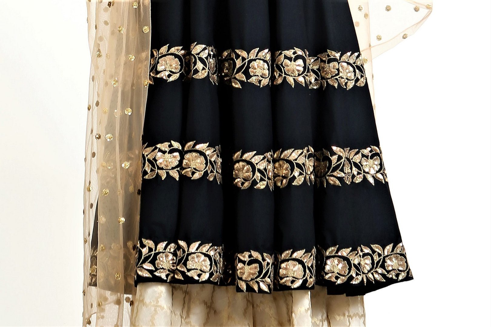 Buy black hand embroidered silk short kalidaar with palazzo online in USA. Get occasion ready with a stunning range of Indian designer suits from Pure Elegance fashion store in USA. We bring the best designer dresses for Indian women in USA at our online store. Shop now.-details