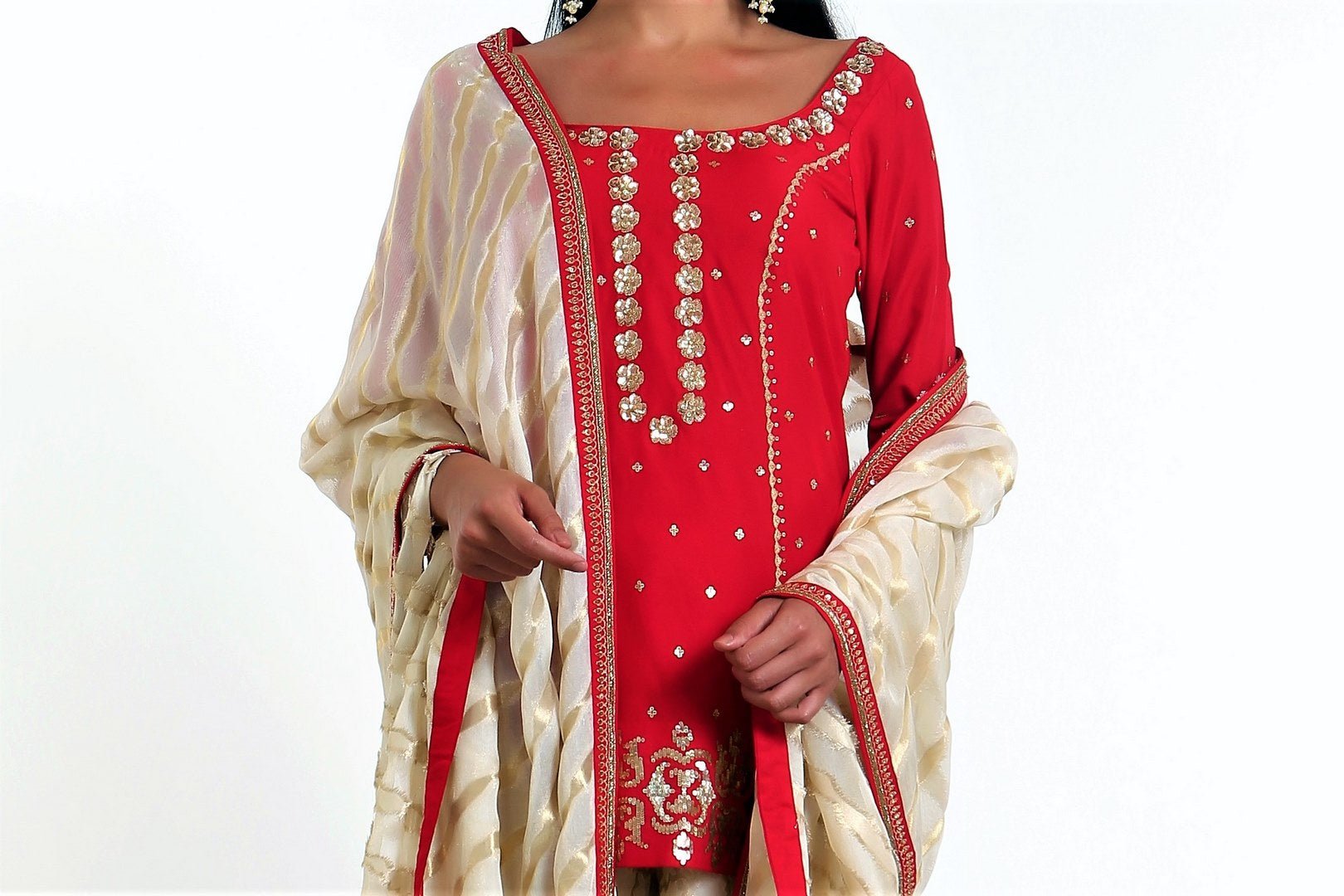 Buy crimson red silk blend short kurta with gold tissue net gharara online in USA. Get occasion ready with a stunning range of Indian designer suits from Pure Elegance fashion store in USA. We bring the best designer dresses for Indian women in USA at our online store. Shop now.-kurta