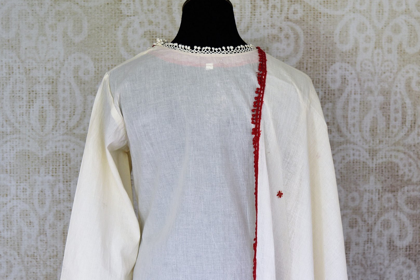 Buy cream color embroidered kurta with multicolor skirt and dupatta online in USA. Enhance your ethnic style on special occasions with a splendid range of Indian designer clothes for women available at Pure Elegance fashion store in USA.-back