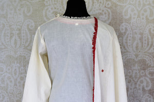 Buy cream color embroidered kurta with multicolor skirt and dupatta online in USA. Enhance your ethnic style on special occasions with a splendid range of Indian designer clothes for women available at Pure Elegance fashion store in USA.-back
