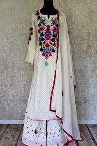 Buy cream color embroidered cotton suit with palazzo online in USA. Enhance your ethnic style on special occasions with a splendid range of Indian designer clothes for women available at Pure Elegance fashion store in USA.-full view