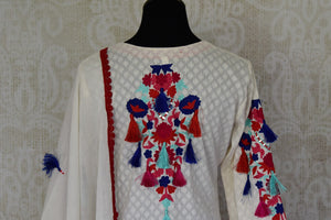 Buy cream color embroidered cotton suit with palazzo online in USA. Enhance your ethnic style on special occasions with a splendid range of Indian designer clothes for women available at Pure Elegance fashion store in USA.-back