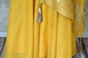 Shop mustard yellow embroidered floor length suit with dupatta online in USA. Enhance your ethnic style on special occasions with a splendid range of Indian designer clothes for women available at Pure Elegance fashion store in USA.-bottom