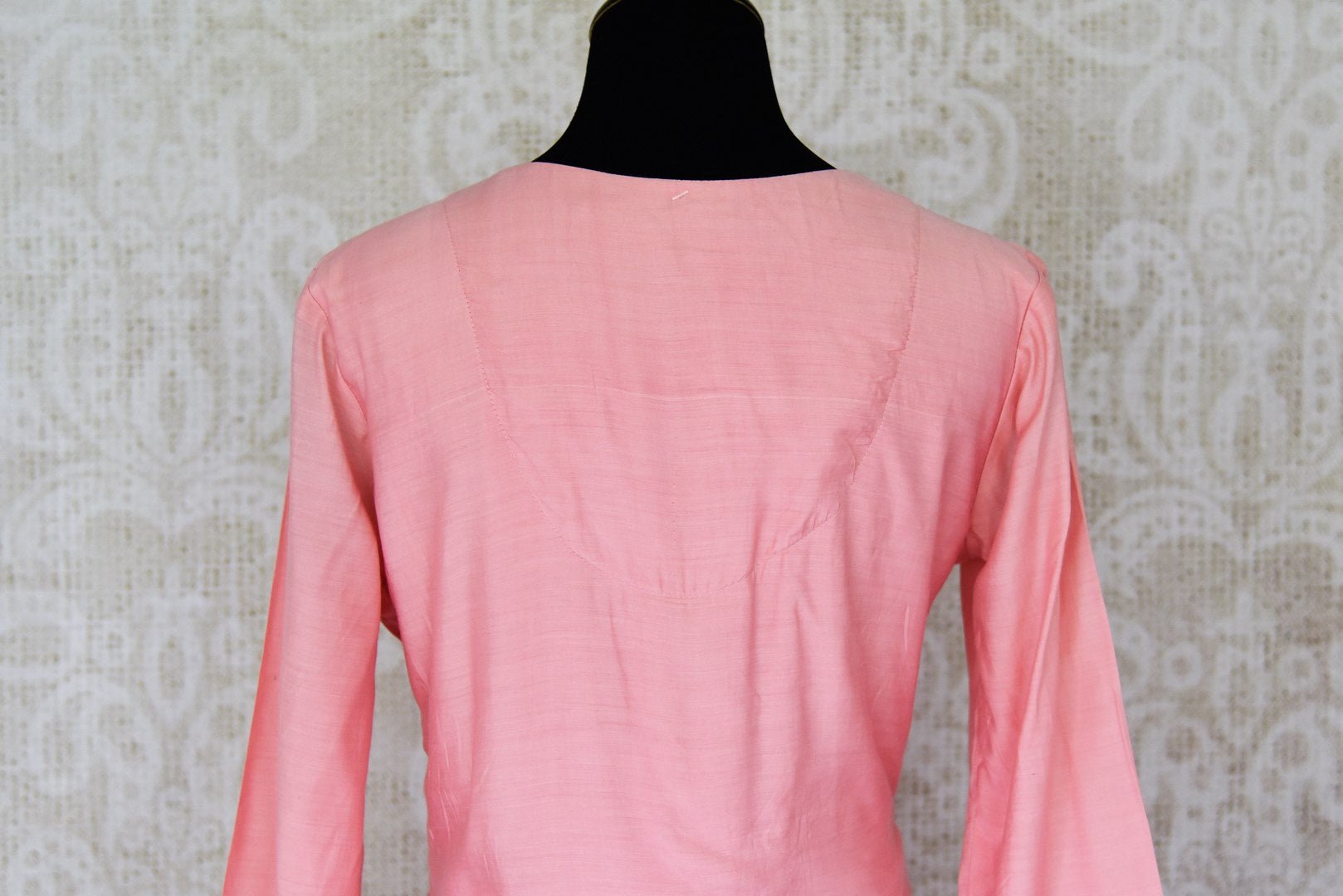 Shop baby pink asymmetric silk suit online in USA. Enhance your ethnic style on special occasions with a splendid range of Indian designer clothes for women available at Pure Elegance fashion store in USA.-back