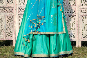 Buy aqua blue embroidered chanderi kurta with skirt online in USA. Find a range of exquisite Indian dresses in USA at Pure Elegance clothing store. Enrich your traditional style with a range of Indian clothing, designer Anarkali suits, wedding lehengas, and much more also available at our online store.-skirt