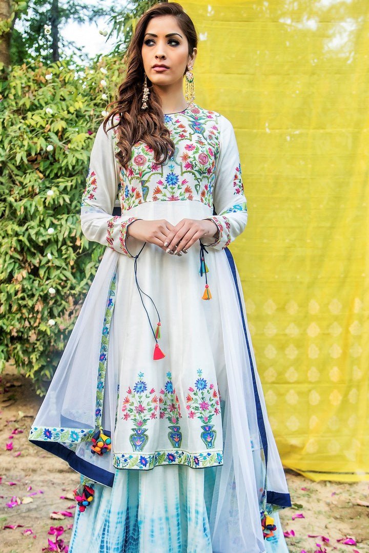 Buy ivory indigo hand painted embroidered chanderi kurta with tie and dye skirt online in USA. Find a range of exquisite Indian dresses in USA at Pure Elegance clothing store. Enrich your traditional style with a range of Indian clothing, designer Anarkali suits, wedding lehengas, and much more also available at our online store.-full view