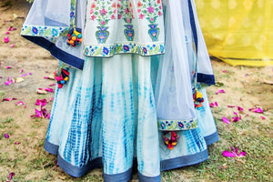 Buy ivory indigo hand painted embroidered chanderi kurta with tie and dye skirt online in USA. Find a range of exquisite Indian dresses in USA at Pure Elegance clothing store. Enrich your traditional style with a range of Indian clothing, designer Anarkali suits, wedding lehengas, and much more also available at our online store.-skirt