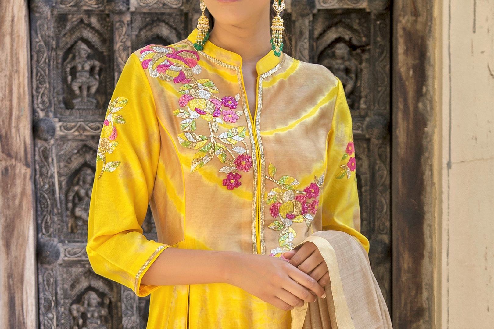Buy yellow embroidered chanderi tie and dye suit with palazzo online in USA. Find a range of exquisite Indian dresses in USA at Pure Elegance clothing store. Enrich your traditional style with a range of Indian clothing, designer Anarkali suits, wedding lehengas, and much more also available at our online store.-top