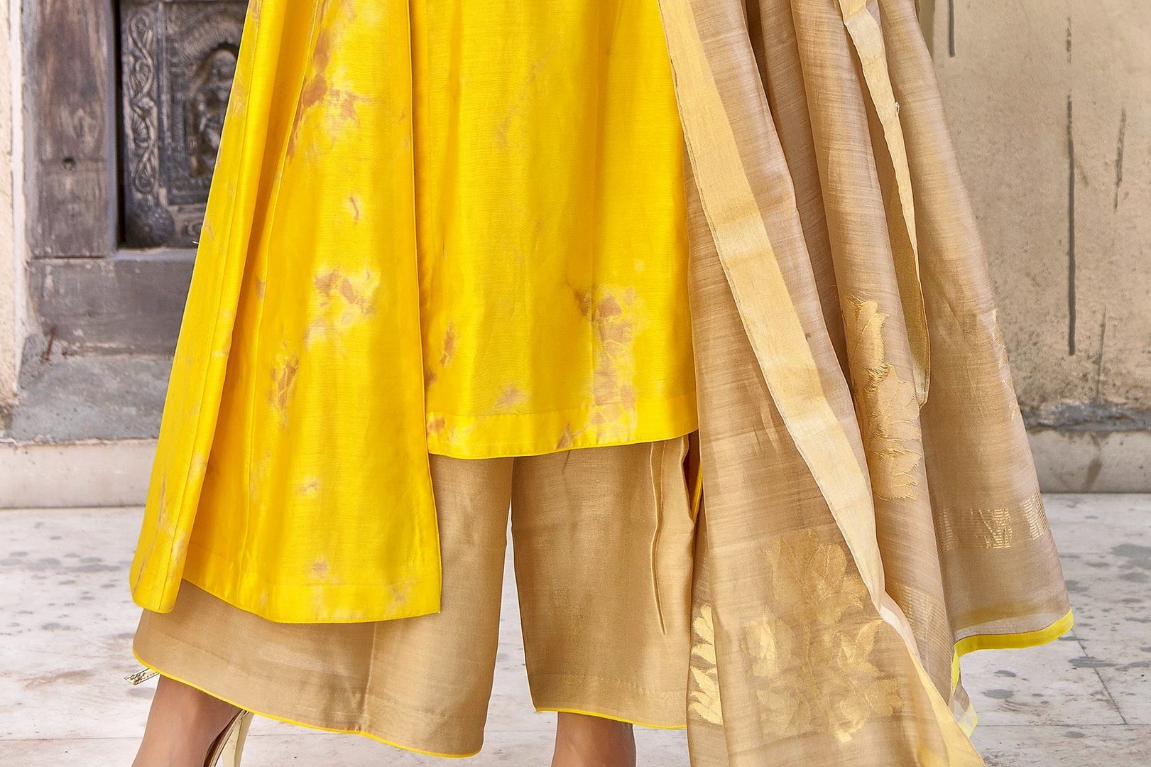 Buy yellow embroidered chanderi tie and dye suit with palazzo online in USA. Find a range of exquisite Indian dresses in USA at Pure Elegance clothing store. Enrich your traditional style with a range of Indian clothing, designer Anarkali suits, wedding lehengas, and much more also available at our online store.-bottom