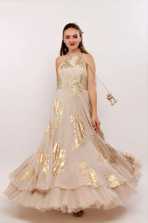 Buy beige gold printed embroidered Anarkali with yellow dupatta and churidaar online in USA. Pick your favorite Indian designer suits and dresses from Pure Elegance clothing store in USA. Ace your style game with a range of Indian saris, Anarkali suits, designer lehengas also available on our online store.  -front