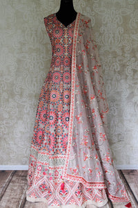 Buy ivory embroidered chanderi floor-length Anarkali with dupatta online in USA. Elevate your ethnic style with a range of captivating Indian designer suits from Pure Elegance Indian clothing store in USA. Add designer clothing, embroidered sarees, pure silk saris to your wardrobe for a beautiful look this festive season.-full view