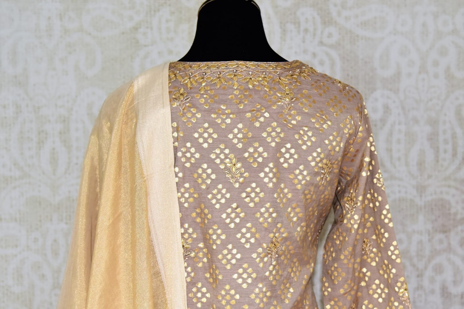 Buy beige color gota patti embroidery kurta with palazzo online in USA. Elevate your ethnic style with a range of captivating Indian designer clothing from Pure Elegance Indian clothing store in USA. Add designer suits, embroidered sarees, pure silk saris to your wardrobe for a beautiful look this festive season.-back