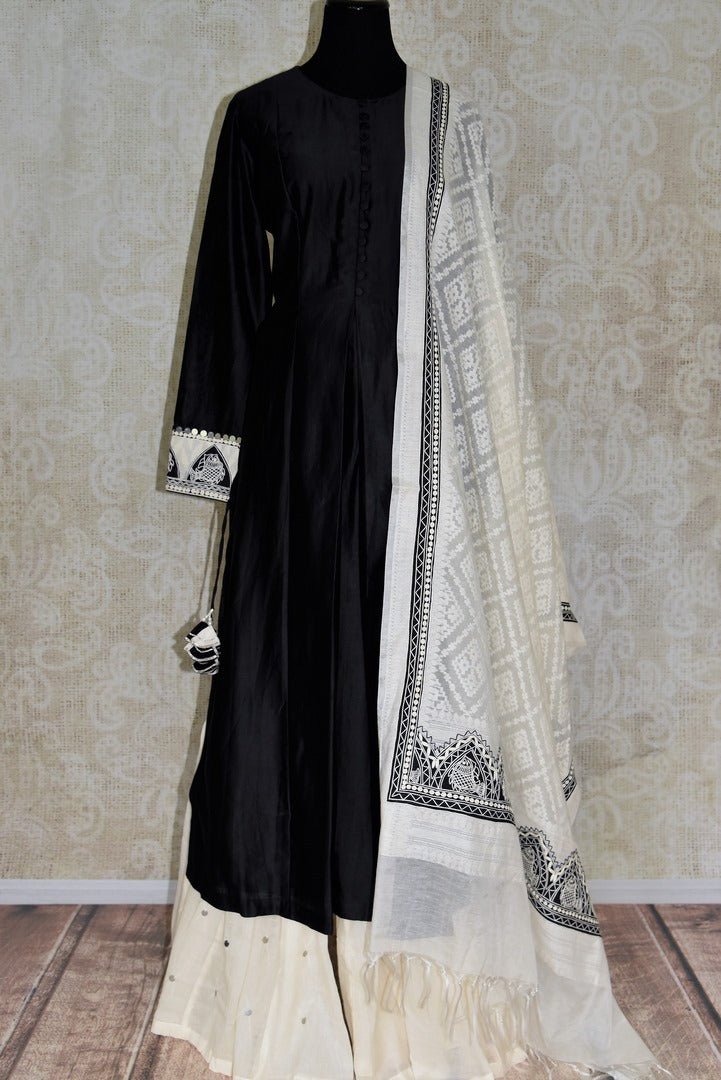 Buy black silk kurta with white palazzo online in USA and embroidered dupatta. Elevate your ethnic style with a range of captivating Indian designer clothes from Pure Elegance Indian clothing store in USA. Make the festive season bright with beautiful pure silk saris, Banarasi saris, designer suits from our online store.-full view