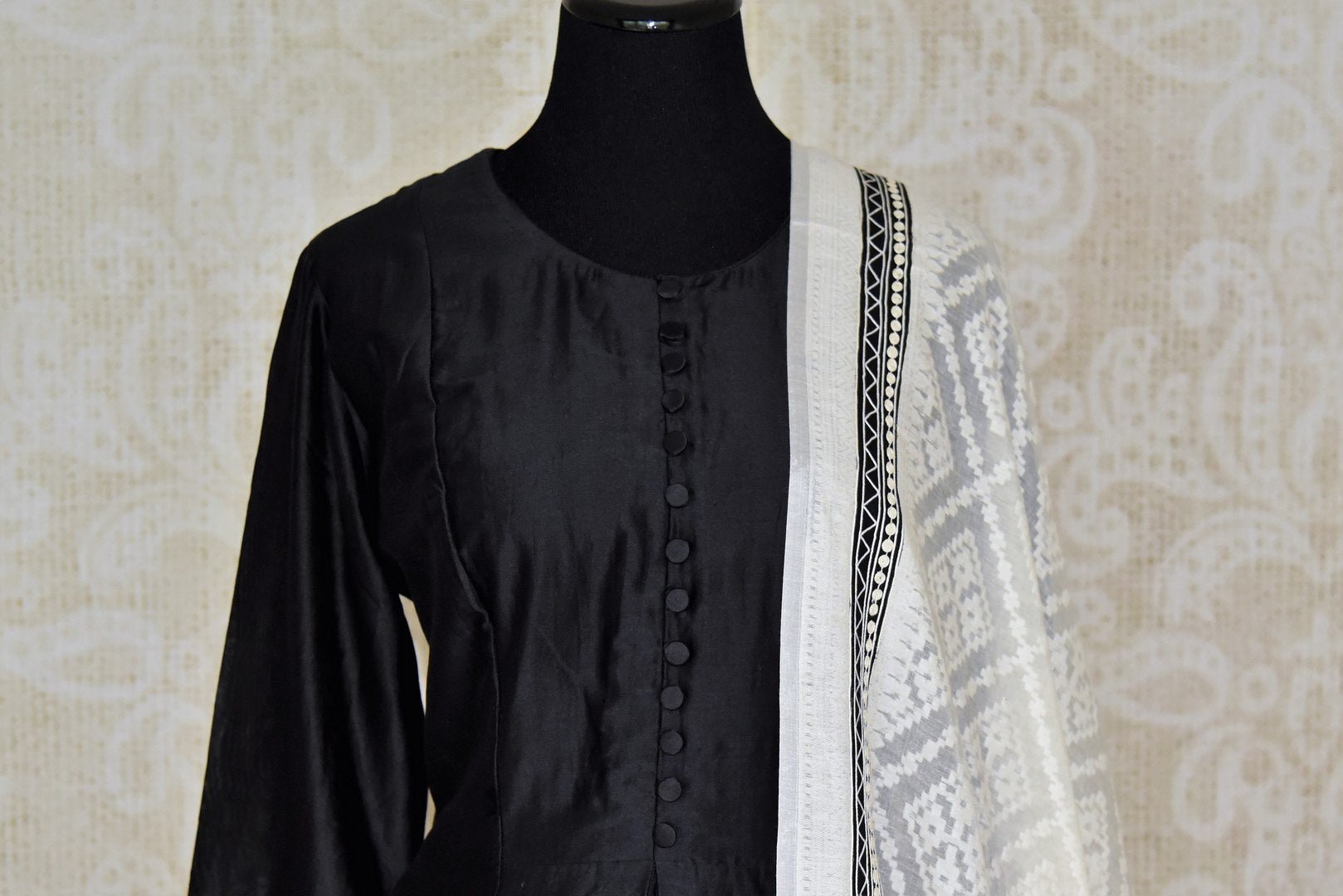 Buy black silk kurta with white palazzo online in USA and embroidered dupatta. Elevate your ethnic style with a range of captivating Indian designer clothes from Pure Elegance Indian clothing store in USA. Make the festive season bright with beautiful pure silk saris, Banarasi saris, designer suits from our online store.-front