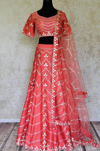 Buy bright red embroidered silk lehenga online in USA with dupatta. Get ready to dazzle on weddings and special occasions with an exquisite variety of Indian designer clothes from Pure Elegance Indian clothing store in USA. We have a splendid collection of bridal lehengas, designer sarees, Anarkali suits to make your look absolutely one of kind.-full view