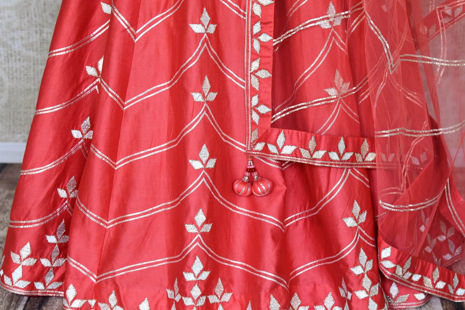 Buy bright red embroidered silk lehenga online in USA with dupatta. Get ready to dazzle on weddings and special occasions with an exquisite variety of Indian designer clothes from Pure Elegance Indian clothing store in USA. We have a splendid collection of bridal lehengas, designer sarees, Anarkali suits to make your look absolutely one of kind.-bottom