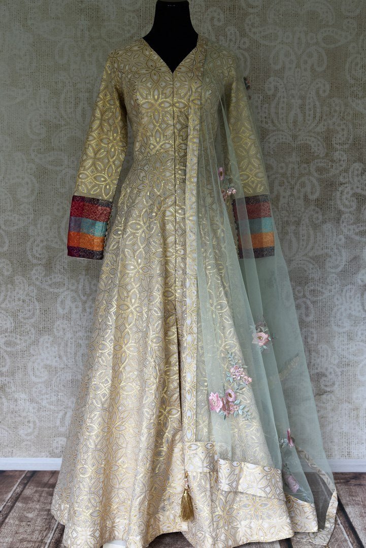 Buy beige color embroidered chanderi Anarkali with dupatta online in USA. Elevate your ethnic style with a range of captivating Indian designer clothing from Pure Elegance Indian clothing store in USA. Add designer suits, embroidered sarees, pure silk saris to your wardrobe for a beautiful look this festive season.-full view