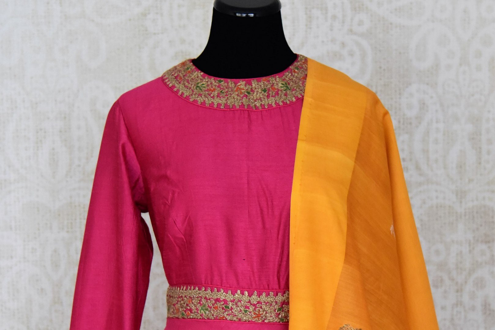 Buy pink embroidered silk floor length Anarkali suit online in USA with yellow dupatta. Shine bright on special occasions with traditional Indian dresses, designer lehengas, Anarkali suits in exquisite designs from Pure Elegance Indian fashion store in USA.-front