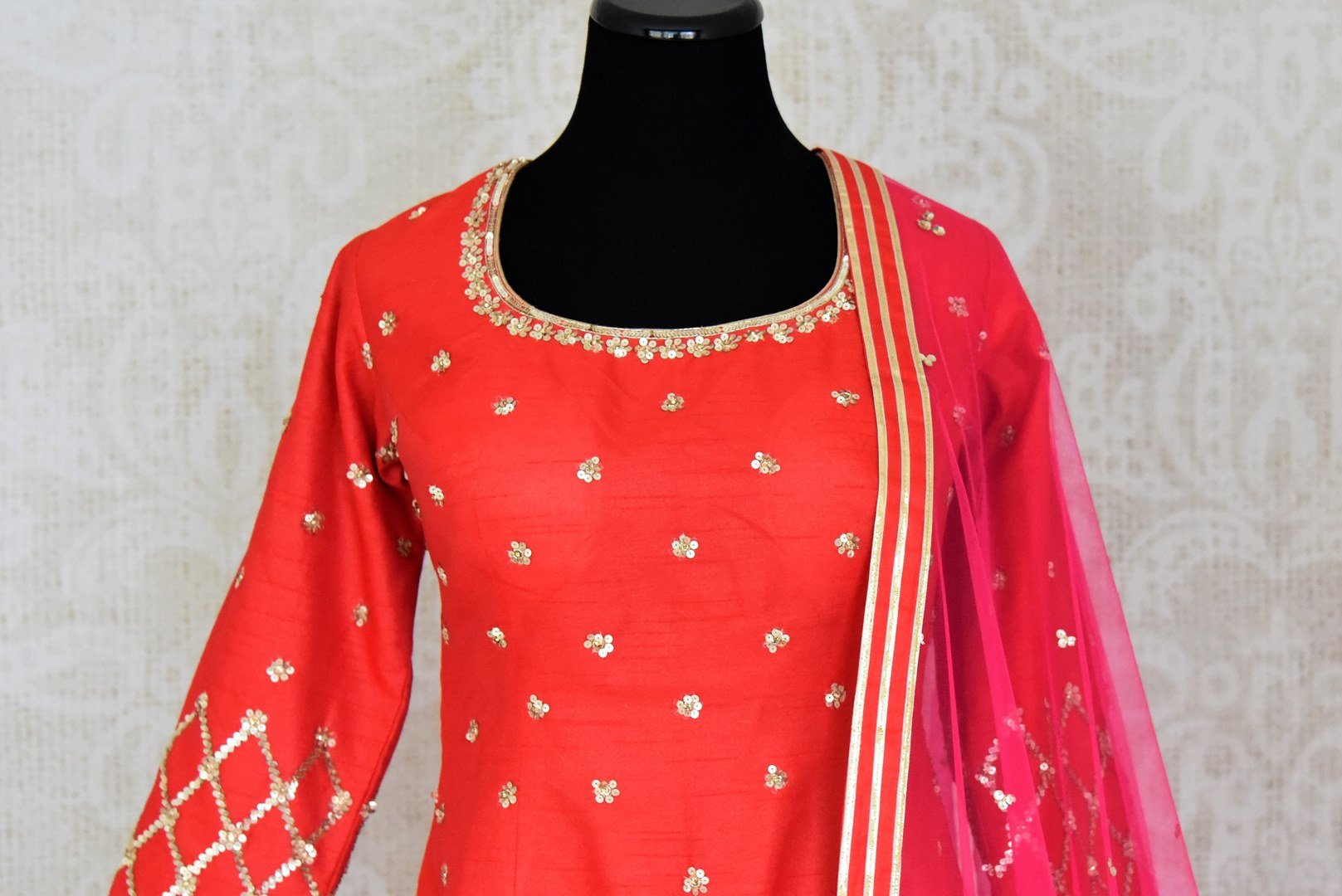 Shop red embroidered silk kurta with sharara online in USA with pink dupatta. Shine bright on special occasions with traditional Indian dresses, designer lehengas, Anarkali suits in exquisite designs from Pure Elegance Indian fashion store in USA.-front