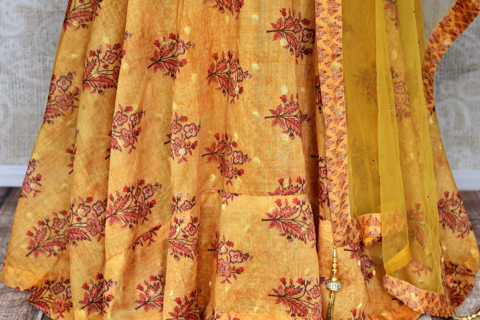 Buy mustard floral print silk floorlength Anarkali suit with dupatta online in USA. Shop more such Indian designer Anarkali suits, designer Indian dresses, wedding dresses in USA from Pure Elegance clothing fashion store this wedding season.-bottom