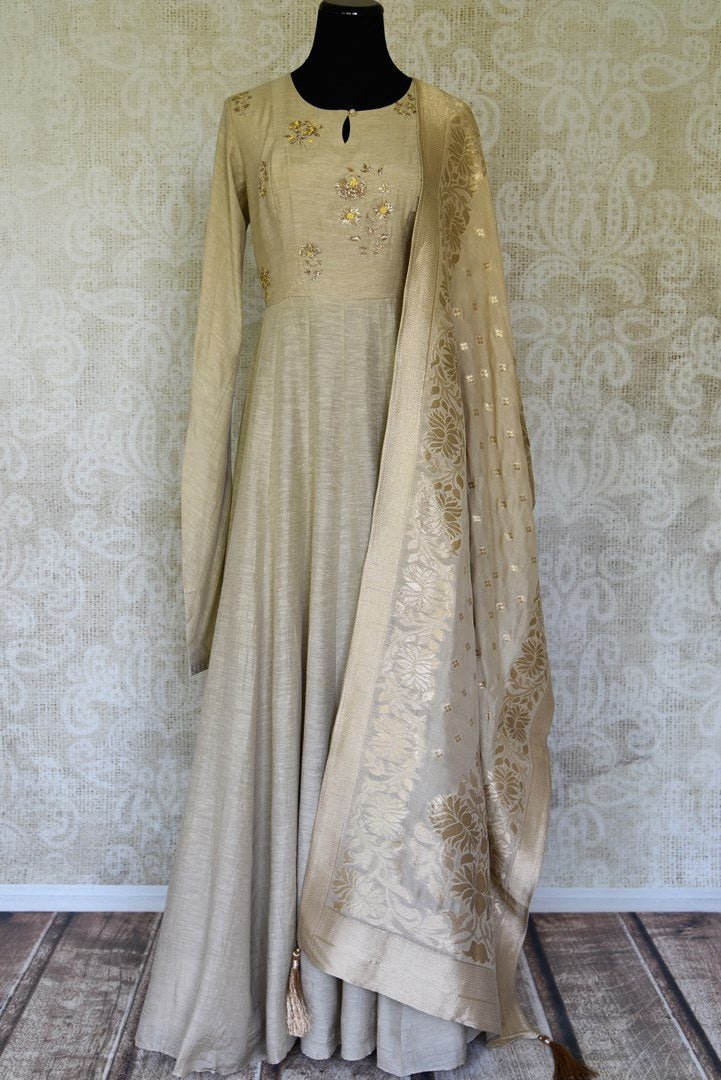 Shop stunning beige embroidered floorlength silk Anarkali suit with dupatta online in USA. Shop more such traditional Indian suits, designer wedding dresses, Anarkali suits in USA from Pure Elegance clothing fashion store this wedding season.-full view