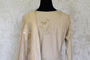 Shop stunning beige embroidered floorlength silk Anarkali suit with dupatta online in USA. Shop more such traditional Indian suits, designer wedding dresses, Anarkali suits in USA from Pure Elegance clothing fashion store this wedding season.-back