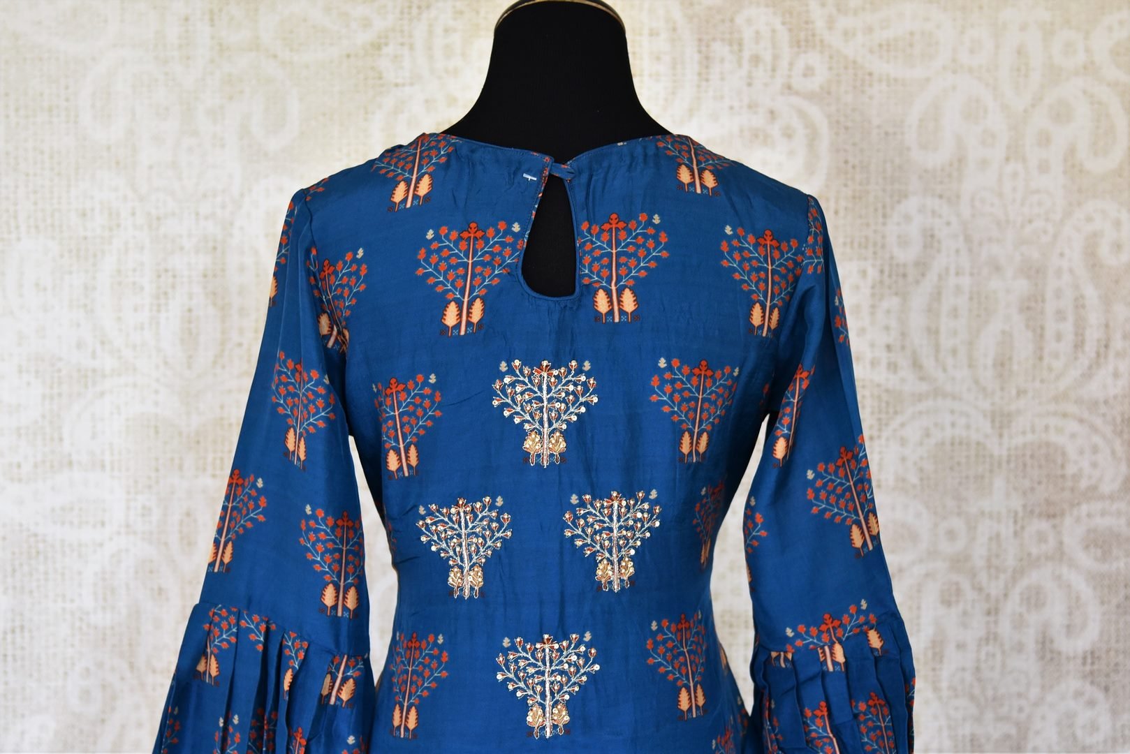 Buy beautiful blue embroidered silk suit with matching palazzo online in USA from Pure Elegance. Add exquisite Indian designer suits, Indian dresses, wedding lehengas in beautiful styles and designs to your ethnic wardrobe from our Indian clothing store in USA or shop online.-back