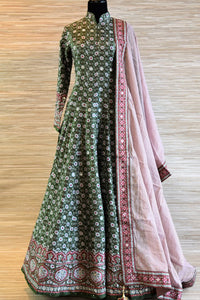 Shop dark green chanderi silk patola print Anarkali suit online in USA with dupatta. Be the talk of every occasion with exquisite Indian designer suits from Pure Elegance Indian clothing store in USA. -full view