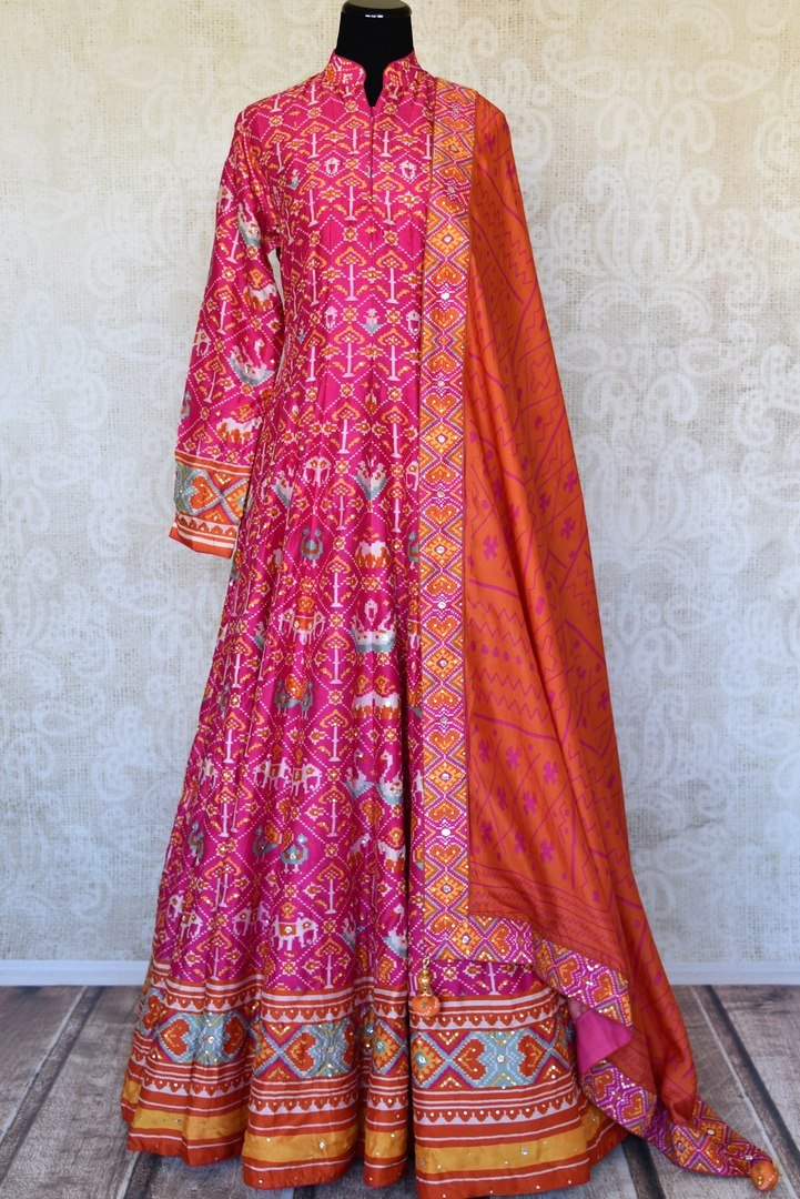 Shop pink ikat silk Anarkali suit online in USA with handwork and dupatta. Make your party style absolutely special with beautiful Indian designer suits from Pure Elegance Indian fashion store in USA. Get floored with a range of beautiful Anarkali suits, designer lehengas, Indian dresses all under one roof for Indian women in USA.-full view