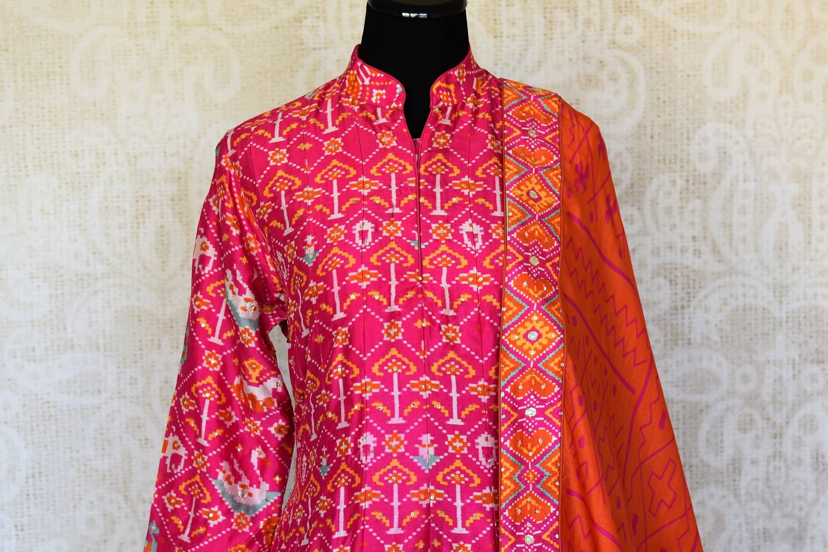 Shop pink ikat silk Anarkali suit online in USA with handwork and dupatta. Make your party style absolutely special with beautiful Indian designer suits from Pure Elegance Indian fashion store in USA. Get floored with a range of beautiful Anarkali suits, designer lehengas, Indian dresses all under one roof for Indian women in USA.-front