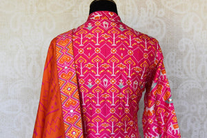 Shop pink ikat silk Anarkali suit online in USA with handwork and dupatta. Make your party style absolutely special with beautiful Indian designer suits from Pure Elegance Indian fashion store in USA. Get floored with a range of beautiful Anarkali suits, designer lehengas, Indian dresses all under one roof for Indian women in USA.-back