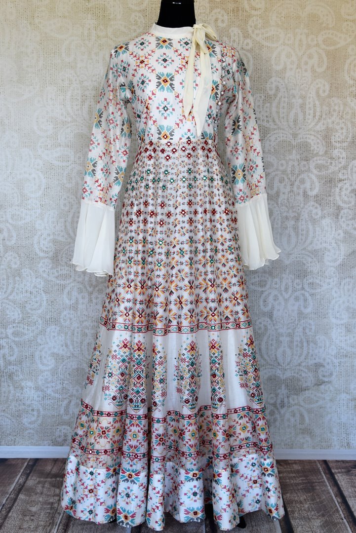 Shop elegant white silk Anarkali dress online in USA with mirror work. Make your party style absolutely special with beautiful Indian designer suits from Pure Elegance Indian fashion store in USA. Get floored with a range of beautiful Anarkali suits, designer lehengas, Indian dresses all under one roof for Indian women in USA.-full view
