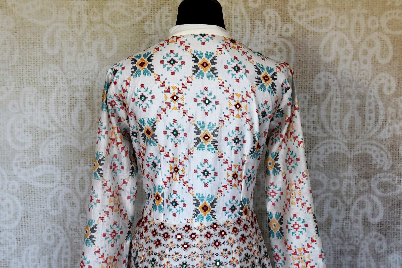 Shop elegant white silk Anarkali dress online in USA with mirror work. Make your party style absolutely special with beautiful Indian designer suits from Pure Elegance Indian fashion store in USA. Get floored with a range of beautiful Anarkali suits, designer lehengas, Indian dresses all under one roof for Indian women in USA.-back