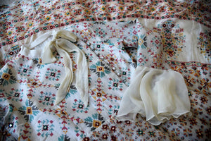 Shop elegant white silk Anarkali dress online in USA with mirror work. Make your party style absolutely special with beautiful Indian designer suits from Pure Elegance Indian fashion store in USA. Get floored with a range of beautiful Anarkali suits, designer lehengas, Indian dresses all under one roof for Indian women in USA.-details