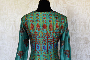 Buy green printed crepe silk Anarkali dress online in USA with handwork. Make your party style absolutely special with beautiful Indian designer suits from Pure Elegance Indian fashion store in USA. Get floored with a range of beautiful Anarkali suits, designer lehengas, Indian dresses all under one roof for Indian women in USA.-back